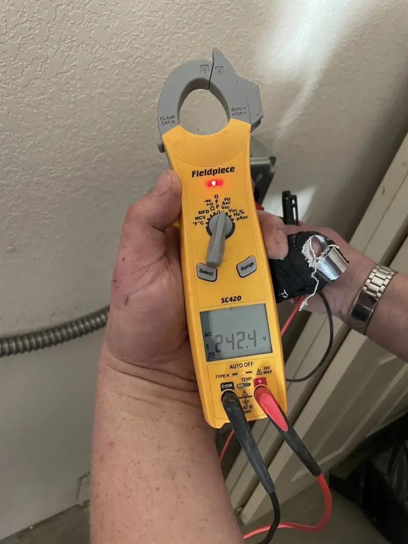 Voltage testing with clamp meter during Generator Installation in Fairfield